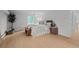 Bright bedroom featuring hardwood floors, a comfortable bed, and a dormer window at 2684 Taft Ct, Lakewood, CO 80215