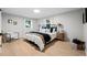 Stylishly furnished bedroom featuring a comfortable bed, bedside tables, and ample natural light at 2684 Taft Ct, Lakewood, CO 80215
