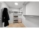 Organized walk-in closet with ample shelving and storage space for clothing and accessories at 2684 Taft Ct, Lakewood, CO 80215