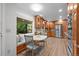 Bright kitchen with a breakfast nook, stainless steel appliances, and wooden cabinets, perfect for Gathering meals at 2684 Taft Ct, Lakewood, CO 80215
