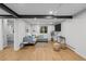 Cozy living area in a finished basement with comfortable seating and natural light at 2684 Taft Ct, Lakewood, CO 80215