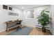 Home office with natural light, hardwood floors, and a minimalist design at 2684 Taft Ct, Lakewood, CO 80215