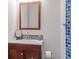 Bathroom featuring tiled backsplash and modern fixtures with vanity at 319 Camino Bosque, Boulder, CO 80302
