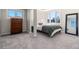 Bright bedroom features neutral walls, plush carpet, and natural light from the window at 319 Camino Bosque, Boulder, CO 80302