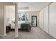 This bedroom features neutral walls, plush carpet, natural light, a large mirror and a closet at 319 Camino Bosque, Boulder, CO 80302