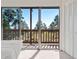 Sunlight illuminates a bedroom with beautiful outdoor views and natural light at 319 Camino Bosque, Boulder, CO 80302