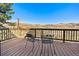 Outdoor deck with chairs overlooking distant mountain views at 319 Camino Bosque, Boulder, CO 80302