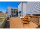 Wood deck with outdoor seating, a grill, and mountain views at 319 Camino Bosque, Boulder, CO 80302