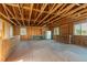 Unfinished interior featuring exposed wood framing and a plywood floor at 319 Camino Bosque, Boulder, CO 80302