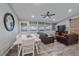 Comfortable living room with great natural light, hardwood floors, and an open floor plan at 7911 Raleigh Pl, Westminster, CO 80030