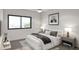 This bright bedroom offers natural light from the large window and neutral decor at 433 N Havana # 308, Aurora, CO 80010