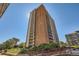 Beautiful high rise building with brick and light beige and open balconies at 955 Eudora St # 1107, Denver, CO 80220