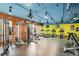 Bright fitness center with modern gym equipment, bright lighting, and a colorful accent wall at 955 Eudora St # 1107, Denver, CO 80220