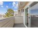 Private balcony with sliding glass door access and AC unit at 10150 E Virginia Ave # 6-305, Denver, CO 80247