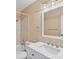 Updated bathroom with quartz countertop and modern fixtures at 10150 E Virginia Ave # 6-305, Denver, CO 80247