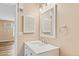 Bathroom with vanity, mirror and white cabinets at 10150 E Virginia Ave # 6-305, Denver, CO 80247