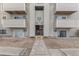 Entrance to building with stairs and landscaping at 10150 E Virginia Ave # 6-305, Denver, CO 80247