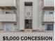 Apartment building exterior featuring private balconies, multiple units, and central entrance at 10150 E Virginia Ave # 6-305, Denver, CO 80247