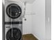 Stackable LG washer and dryer in a dedicated laundry closet at 10150 E Virginia Ave # 6-305, Denver, CO 80247