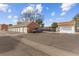 Exterior view of garages and parking lot with mailboxes at 10150 E Virginia Ave # 6-305, Denver, CO 80247