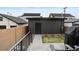 Private backyard featuring sleek, modern siding and patio space at 3646 Quivas St, Denver, CO 80211
