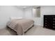 Clean bedroom showcasing a comfortable bed, modern fixtures, and natural light at 3646 Quivas St, Denver, CO 80211
