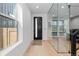 Bright, spacious foyer with glass enclosed office provides plenty of natural light and privacy at 3646 Quivas St, Denver, CO 80211