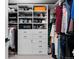 Organized walk-in closet with custom shelves, drawers, and ample hanging space at 3646 Quivas St, Denver, CO 80211
