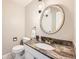 Stylish bathroom featuring an ornate mirror and modern fixtures, perfect for a touch of elegance at 3150 Lane Ct, Boulder, CO 80305