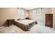 Cozy bedroom with plush carpeting, windows, and furniture, creating a serene atmosphere at 3150 Lane Ct, Boulder, CO 80305