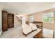 Bright living room featuring neutral carpet, white trim, and multiple windows for ample natural light at 3150 Lane Ct, Boulder, CO 80305