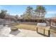 Backyard features a stone patio with a grill and an unkept grass area at 6348 Westview Cir, Parker, CO 80134