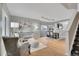 Bright and airy living room showcasing stylish furniture and beautiful hardwood floors at 6348 Westview Cir, Parker, CO 80134