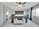 Large main bedroom with a sitting area and a ceiling fan at 6348 Westview Cir, Parker, CO 80134