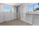 Spacious walk-in closet with built-in drawers, shelving, and ample storage solutions at 900 S Webster St, Lakewood, CO 80226