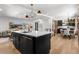 Kitchen view with white countertops, hardwood floors and an open layout at 900 S Webster St, Lakewood, CO 80226