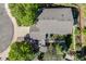 Aerial view of the home showcasing the roof, patio, and surrounding landscaping, highlighting the property's features at 11760 Eudora Ct, Thornton, CO 80233