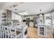 Bright kitchen with granite countertops, stainless steel appliances, and a kitchen island at 11760 Eudora Ct, Thornton, CO 80233