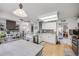 Bright kitchen with granite counters, stainless steel appliances, and open layout at 11760 Eudora Ct, Thornton, CO 80233