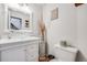 Elegant powder room featuring a modern vanity, stylish decor, and a clean, bright space at 11760 Eudora Ct, Thornton, CO 80233
