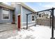 Backyard with covered patio and storage shed at 2028 Ulster St, Denver, CO 80238