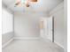 Bright bedroom with neutral walls, carpet flooring, and natural light at 2028 Ulster St, Denver, CO 80238