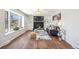 Bright living room with large window, fireplace and modern decor at 12807 Garfield Cir, Thornton, CO 80241