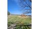 Community park with large grassy area and landscaping at 12807 Garfield Cir, Thornton, CO 80241