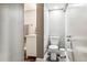 Clean basement bathroom with toilet and sink at 3792 E Briarwood Ave, Centennial, CO 80122