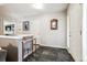 Entryway with slate tile flooring and a decorative wall mirror at 3792 E Briarwood Ave, Centennial, CO 80122