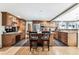 Spacious kitchen with granite countertops and wood cabinetry at 3792 E Briarwood Ave, Centennial, CO 80122