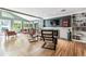 Bright living room with a fireplace and built-in bookshelves at 3792 E Briarwood Ave, Centennial, CO 80122
