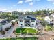 Aerial view of the back of the house with a nice backyard and surrounding landscape at 16486 Florawood Pl, Monument, CO 80132