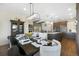 Formal dining room connects to a modern kitchen and living space at 16486 Florawood Pl, Monument, CO 80132